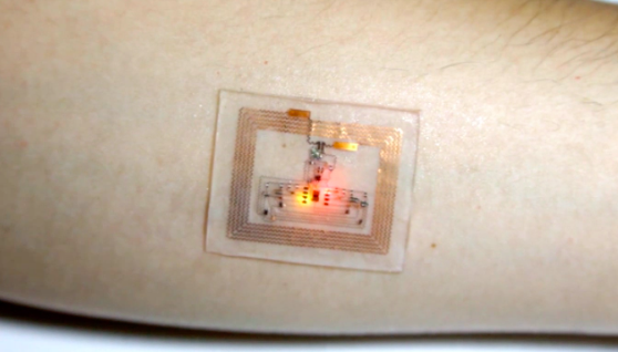 A Health-Monitoring Sticker Powered by Your Cell Phone